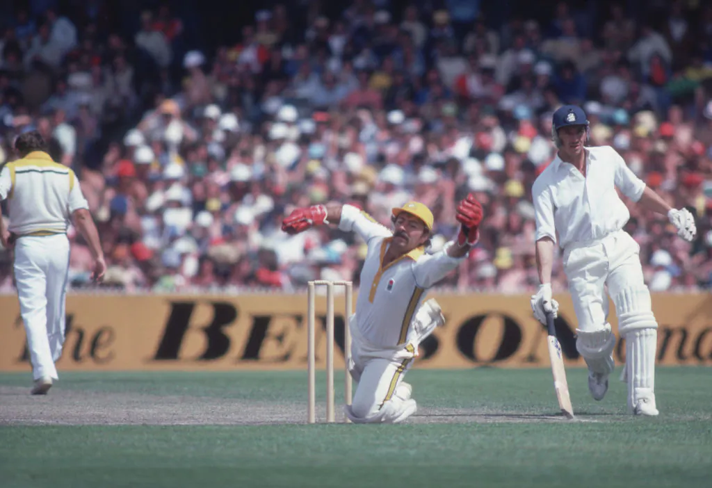 Australian wicketkeeper Rod Marsh with Derek Randall (right) of England during a one-day international in Melbourne, January 1980. (Photo by Adrian Murrell/Getty Images)