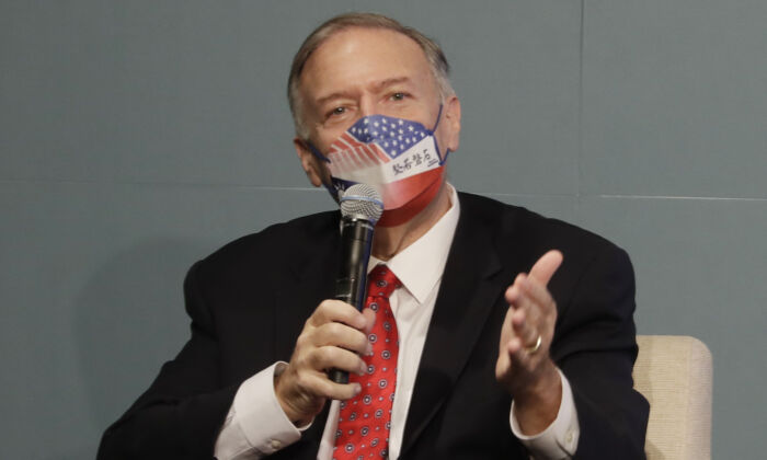 Former U.S. Secretary of State Mike Pompeo answers questions from an audience after delivering a speech during his four-day trip to Taiwan, in Taipei, on March 4, 2022. (Chiang Ying-ying/AP Photo)