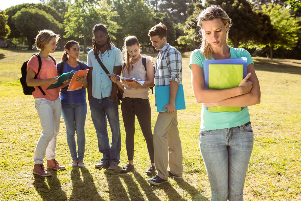 Teens face peer pressure from various sources, school, activities, and social media. (Shutterstock)