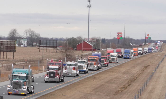 Trucks of The People's Convoy traveling from Indiana to Lore City, Ohio, on March 3, 2022. (Enrico Trigoso/The Epoch Times)