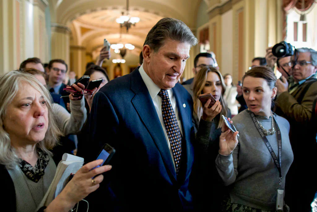 Sen. Joe Manchin (D-West Va.) speaks with reporters at the U.S. Capitol in Washington on Jan. 19, 2018 in Washington. (Aaron P. Bernstein/Getty Images)