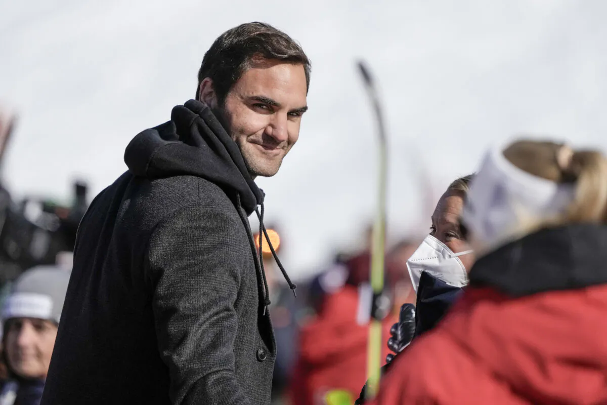 Switzerland's Roger Federer walks in the finish area of an alpine ski, women's World Cup super-G, in Lenzerheide, Switzerland, on March 5, 2022. (Giovanni Auletta/AP Photo)
