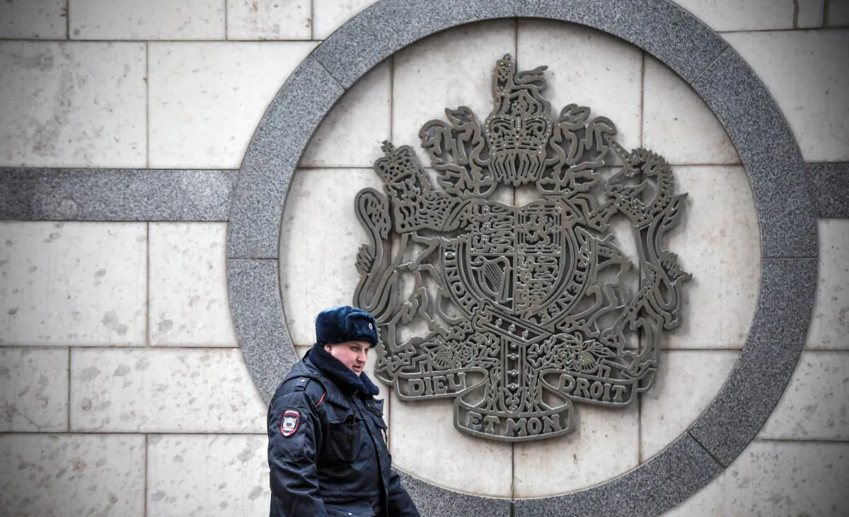 A police officer patrols outside the British embassy building in Moscow on March 14, 2018. (Alexander Nemenov /AFP via Getty Images)