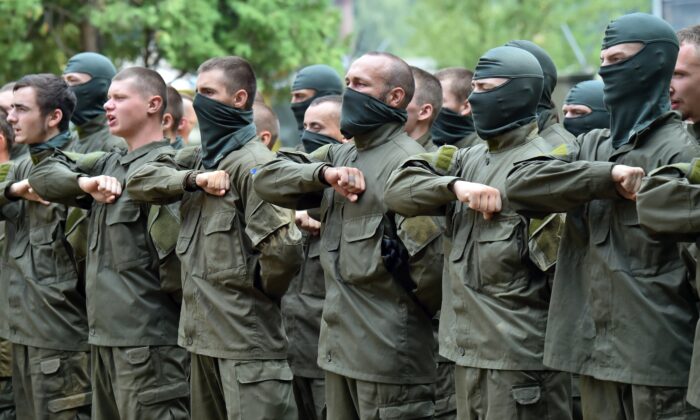 Recruits of the Azov Ukrainian volunteer battalion take their oaths during a ceremony in Kiev, on Aug. 14, 2015. (Sergei Supinsky/AFP via Getty Images)