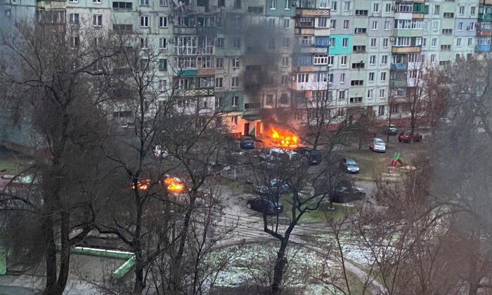 Fire is seen in Mariupol at a residential area after shelling amid Russia's invasion of Ukraine, on March 3, 2022. Twitter (@AyBurlachenko via Reuters)