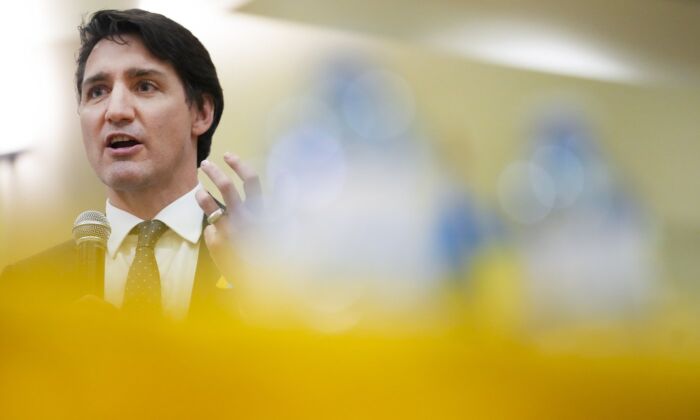 Canadian Prime Minister Justin Trudeau meets with people from the Ukrainian community as Russia has launched a devastating attack and war on Ukraine in Toronto on March 4, 2022. (The Canadian Press/Nathan Denette)
