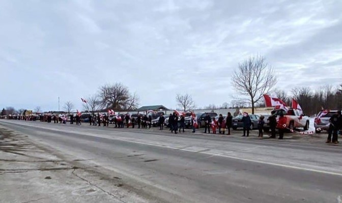 Demonstrators take part in the Freedom Chain event in Havelock-Belmont-Methuen, Ont., on March 5, 2022. (Caleb Shipman)