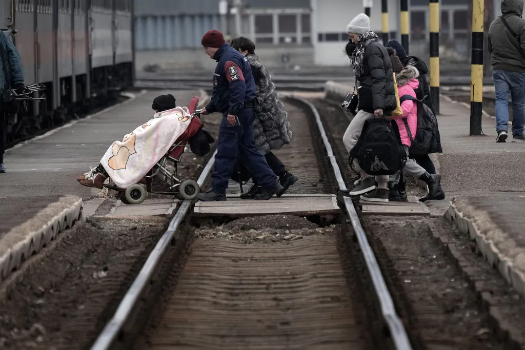 Refugees fleeing Ukraine arrive at Zahony train station in Zahony, Hungary, on March 7, 2022. (Christopher Furlong/Getty Images)