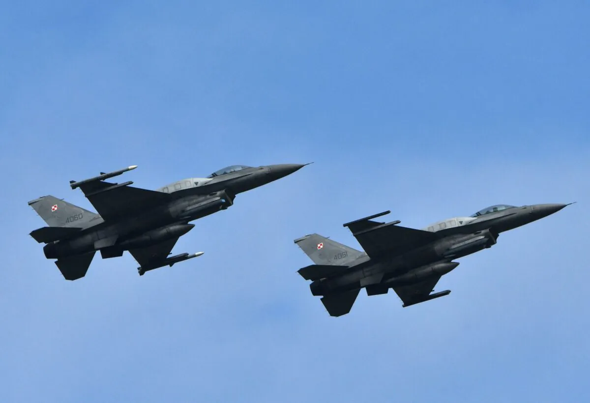 Poland Air Force F-16 Falcons, here in 2022 training flight, could be among fighters that find their way to Ukraine by year's end. (Genya Savilov/AFP via Getty Images)