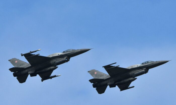 Polish F-16 fighters flight during an air force exercises in a file photo. (Genya Savilov/AFP via Getty Images)