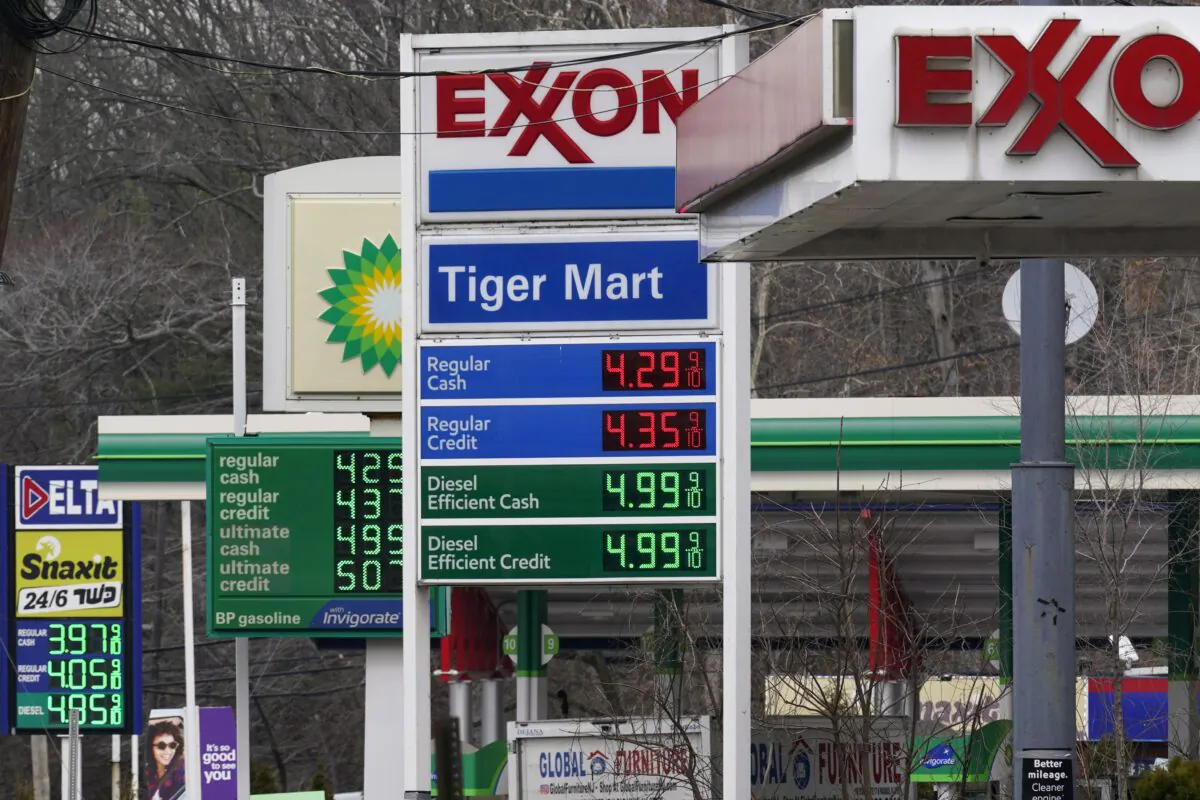 Gas prices are displayed at gas stations in Englewood, N.J., on March 7, 2022. (Seth Wenig/AP Photo)