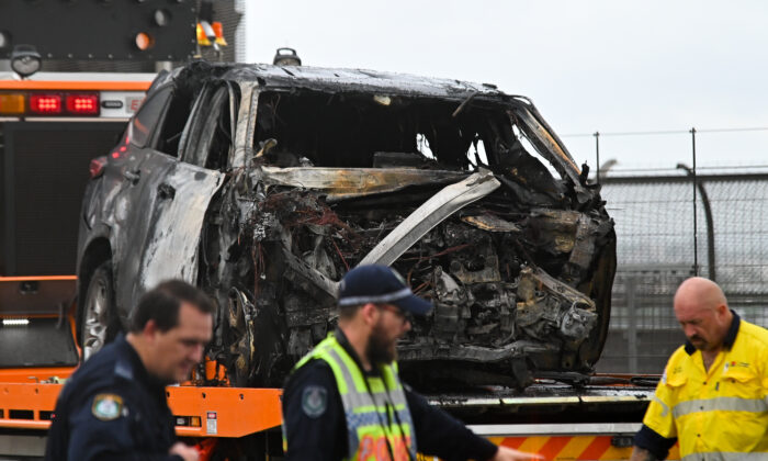 The crash left just a burned husk of one of the three cars. (AAP)