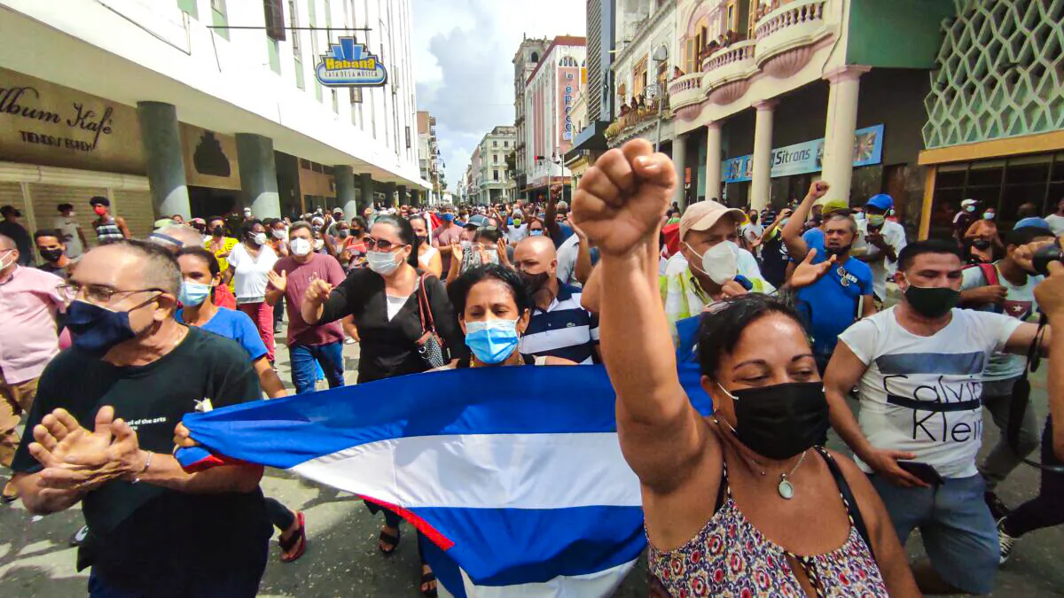 People take part in a demonstration to support the government of the Cuban President Miguel Diaz-Canel in Havana, on July 11, 2021. (Yamil Lage/AFP via Getty Images)
