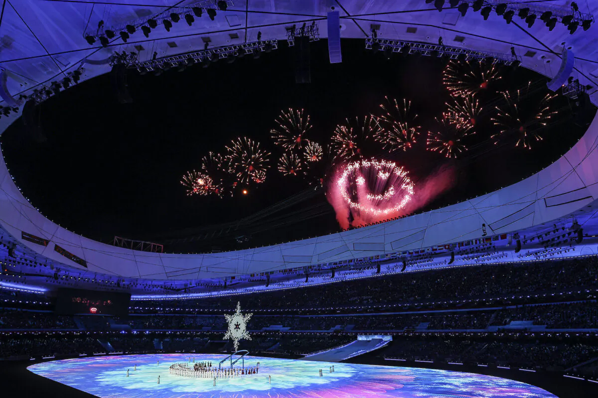 Fireworks are seen as the Olympic cauldron is lit during the Opening Ceremony of the 2022 Beijing Winter Paralympics at the Beijing National Stadium in Beijing, China, on March 4, 2022. (Wang He/Getty Images for International Paralympic Committee)