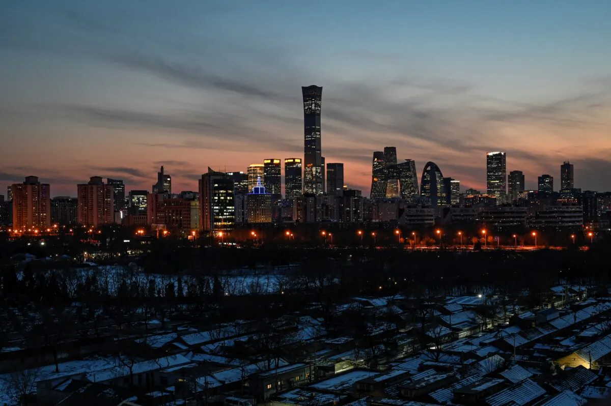 This general view shows the skyline over the central business district at sunset in Beijing on Feb. 16, 2022. (Jade Gao/AFP via Getty Images)