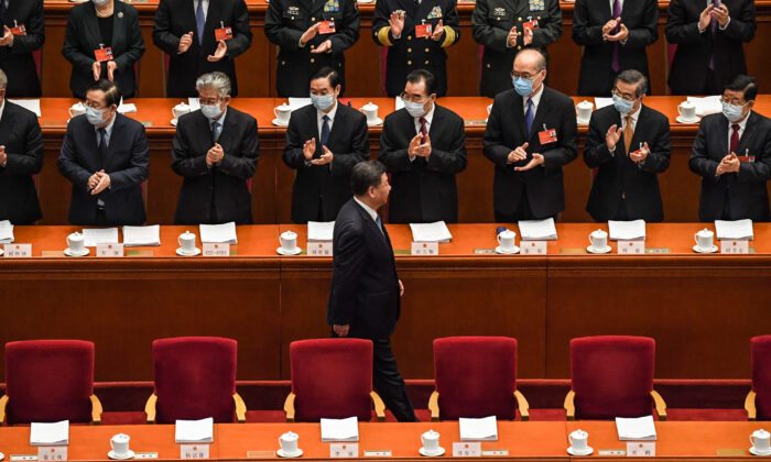 Chinese leader Xi Jinping arrives for the opening session of the rubber-stamp legislature’s conference in Beijing, China on March 5, 2022. (Leo Ramirez/AFP via Getty Images)