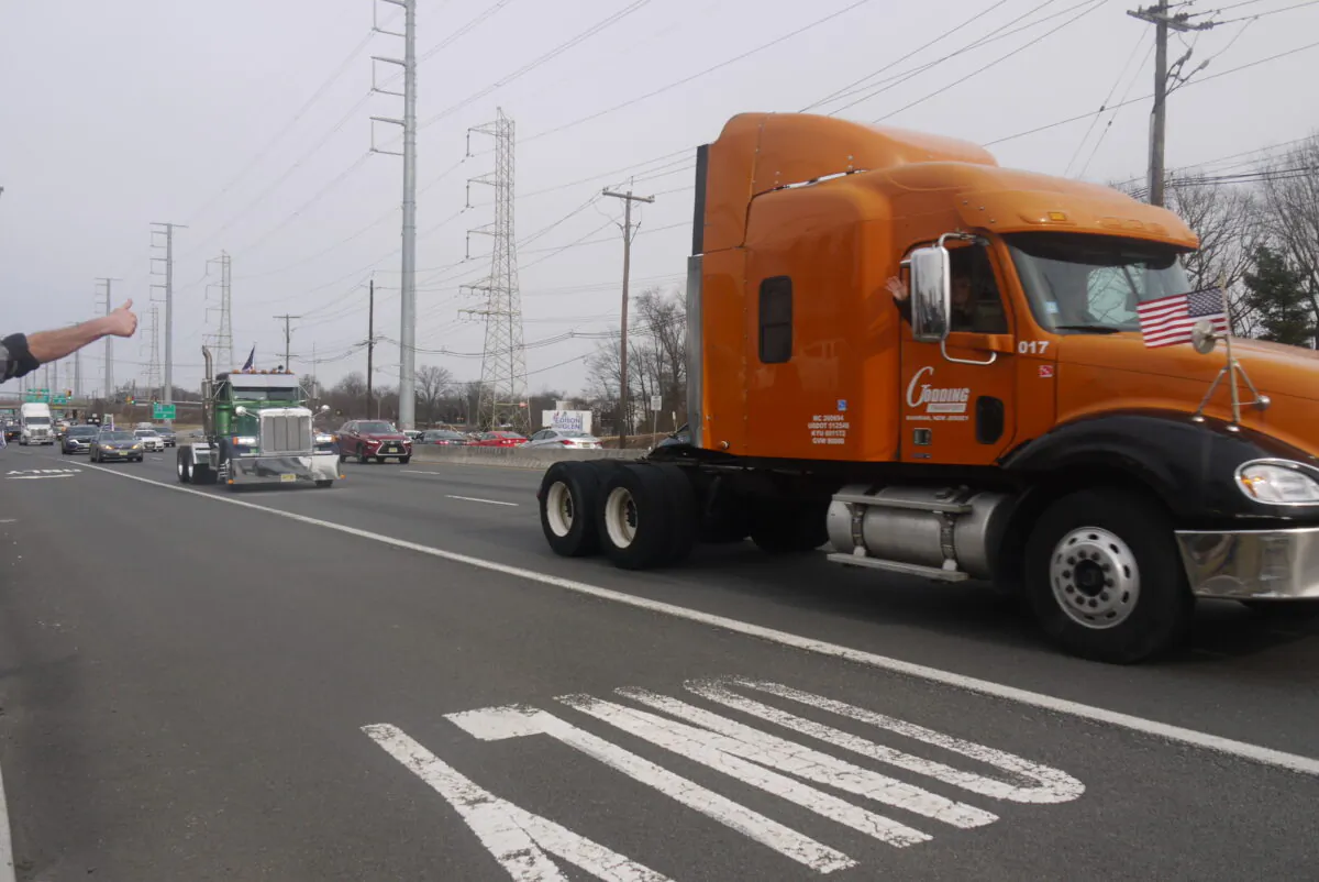 Trucks and vehicles of the New Jersey Convoy on a highway in Edison, New Jersey, on March 5, 2022. (Ella Kietlinska/The Epoch Times)