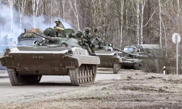 Russian troops enter the Kyiv region, Ukraine, in a still from footage released by the Russian defense ministry on March 3, 2022. (Russian defense ministry via Reuters/Screenshot via The Epoch Times)