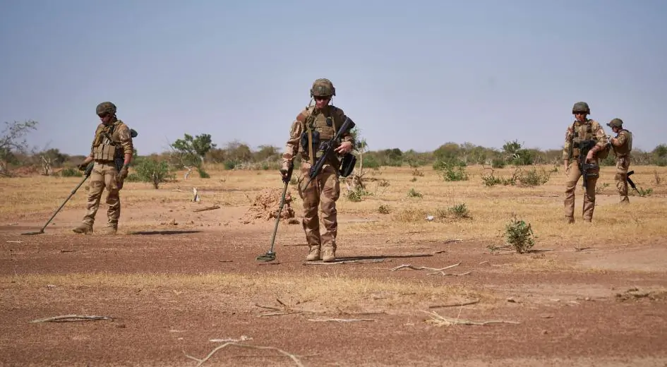 Soldiers from the French army search for the presence of Improvised Explosive Devices during the Burkhane Operation in northern Burkina Faso on Nov. 12, 2019. (Michelle Cattani/ AFP/Getty Image)