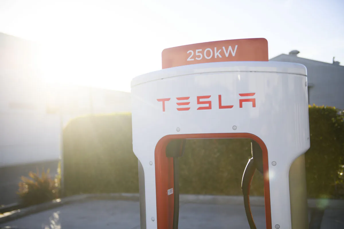 A Tesla logo is seen at a Tesla Inc. supercharger station in Hawthorne, Calif. on Jan. 4, 2021. (Patrick T. Fallon/AFP via Getty Images)