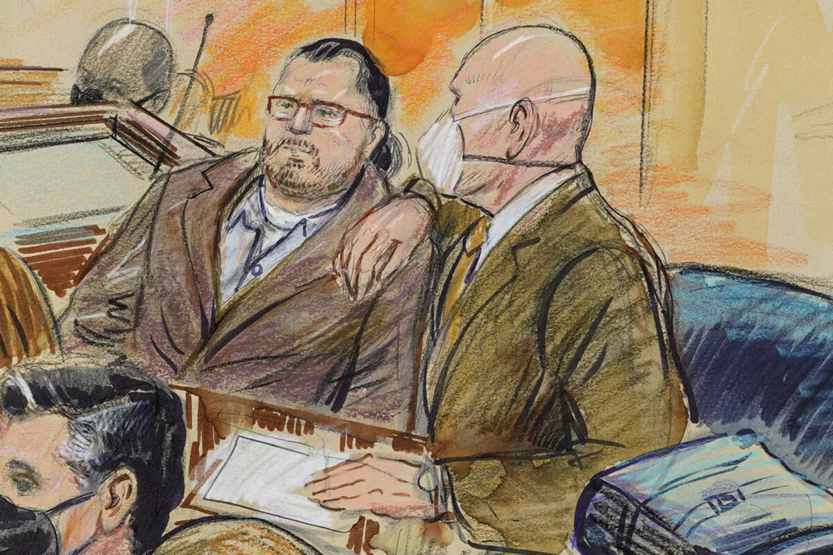 This artist sketch depicts Guy Wesley Reffitt, joined by his lawyer William Welch, right, in Federal Court, in Washington on Feb. 28, 2022. (Dana Verkouteren/San Francisco Chronicle via AP)