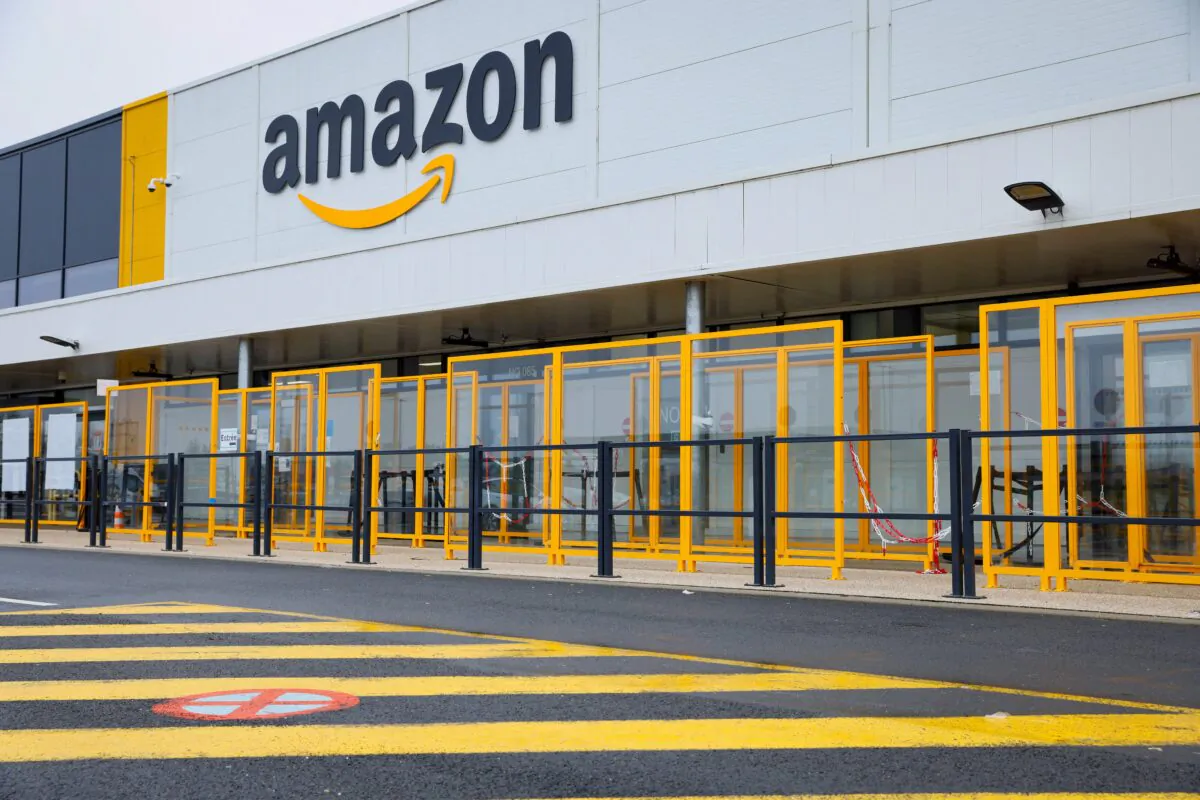 The Amazon logo on the frontage of an Amazon's centre in Bretigny-sur-Orge, France on Dec. 14, 2021. (Thomas Samson/AFP via Getty Images)