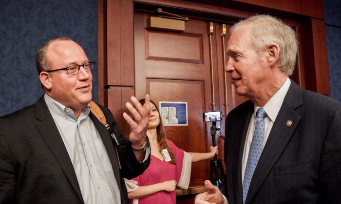 Dr. Pierre Kory (L) and Sen. Ron Johnson (R-Wis.) at the Senate Visitor Center in the U.S. Capitol in Washington on March 8, 2022. (Terri Wu/The Epoch Times)