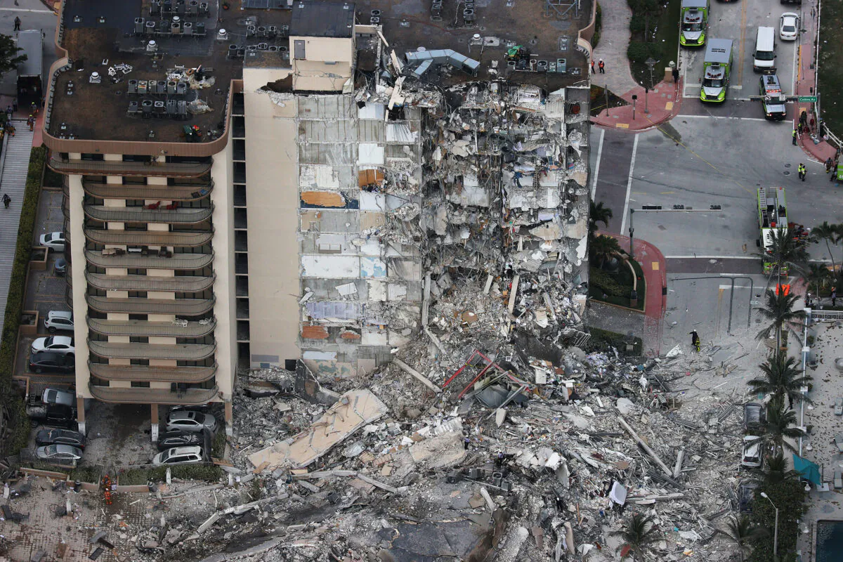 Search and rescue personnel work after the partial collapse of the 12-story Champlain Towers South condo building in Surfside, Fla. on June 24, 2021. (Joe Raedle/Getty Images)