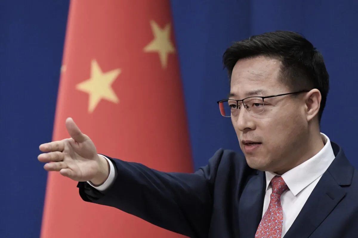 Chinese foreign ministry spokesman Zhao Lijian takes a question at the daily media briefing in Beijing on April 8, 2020. (Greg Baker/AFP via Getty Images)