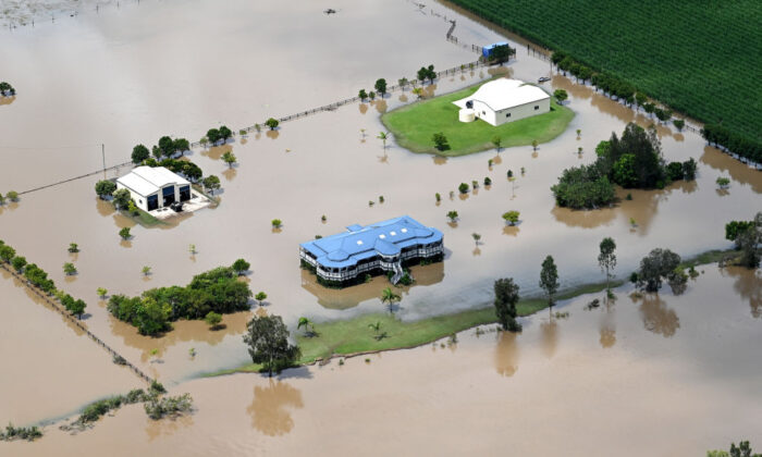In an aerial view, a farm house is seen surrounded by floodwaters in the town of Yandina on the Sunshine Coast, Queensland Australia, on Feb. 27, 2022. (Bradley Kanaris/Getty Images)