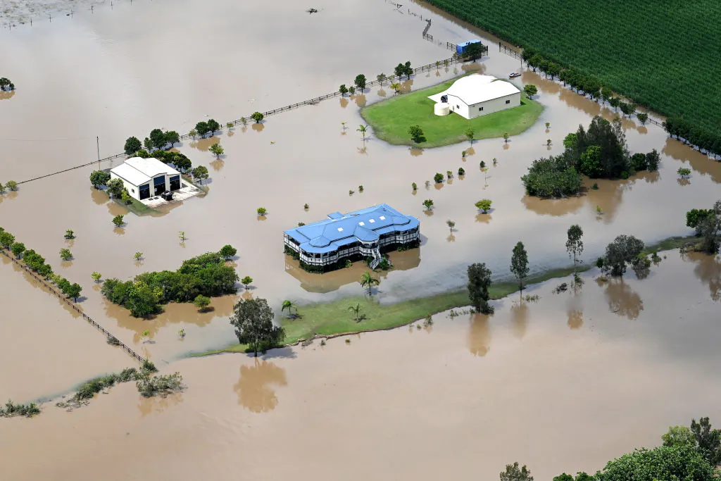 In an aerial view, a farm house is seen surrounded by floodwaters in the town of Yandina on the Sunshine Coast, Queensland Australia, on Feb. 27, 2022. (Bradley Kanaris/Getty Images)
