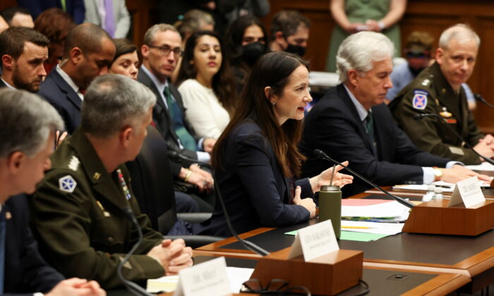 Director of National Intelligence Avril Haines (C) and other U.S. intelligence officials testify to members of Congress in Washington on March 8, 2022. (Evelyn Hockstein/Reuters)