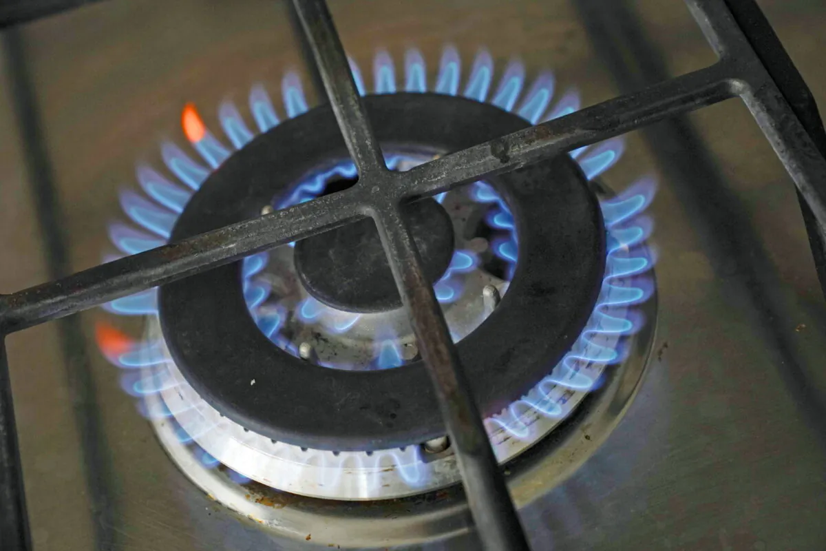 A gas hob in an undated file photo. British households will see the biggest rise in the cost of energy in living memory from April 1, 2022. (Jacob King / PA)