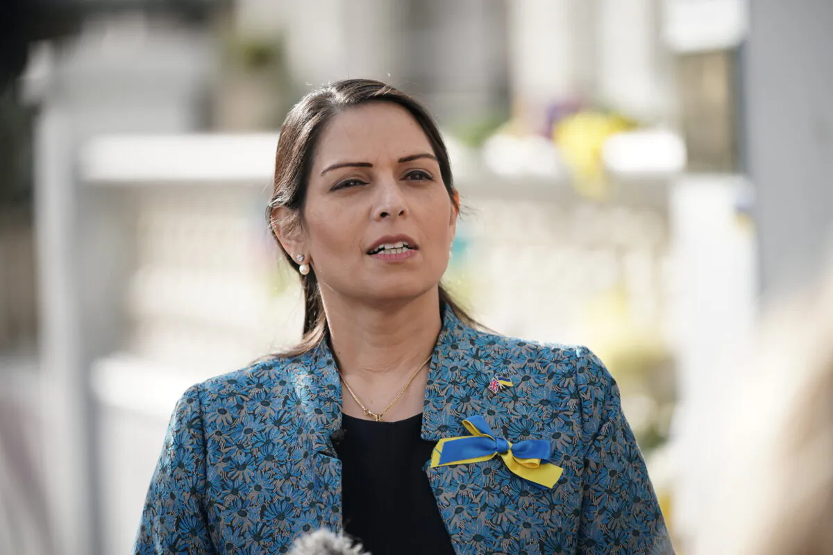 UK Home Secretary Priti Patel speaking to the media outside the Ukrainian embassy in London on March 6, 2022. (Yui Mok/PA)