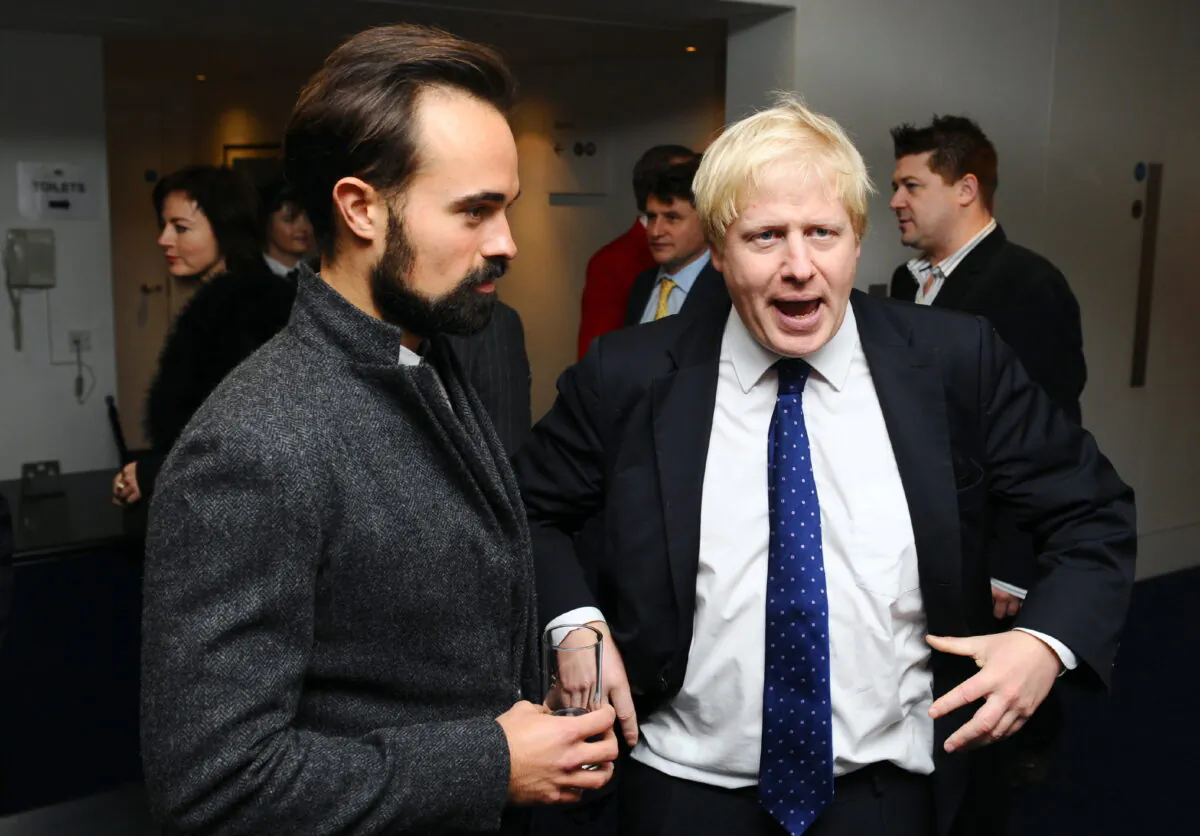 File photo of Evgeny Lebedev (left) and Boris Johnson attending a pre-lunch reception for the Evening Standard Theatre Awards at the Royal Opera House in Covent Garden, London, on Nov. 23, 2009. (Ian West/PA)