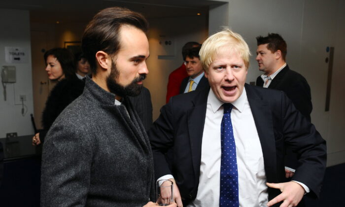 File photo of Evgeny Lebedev (left) and Boris Johnson attend a pre-lunch reception for the Evening Standard Theatre Awards at the Royal Opera House in Covent Garden, London, on Nov. 23, 2009. (Ian West/PA)