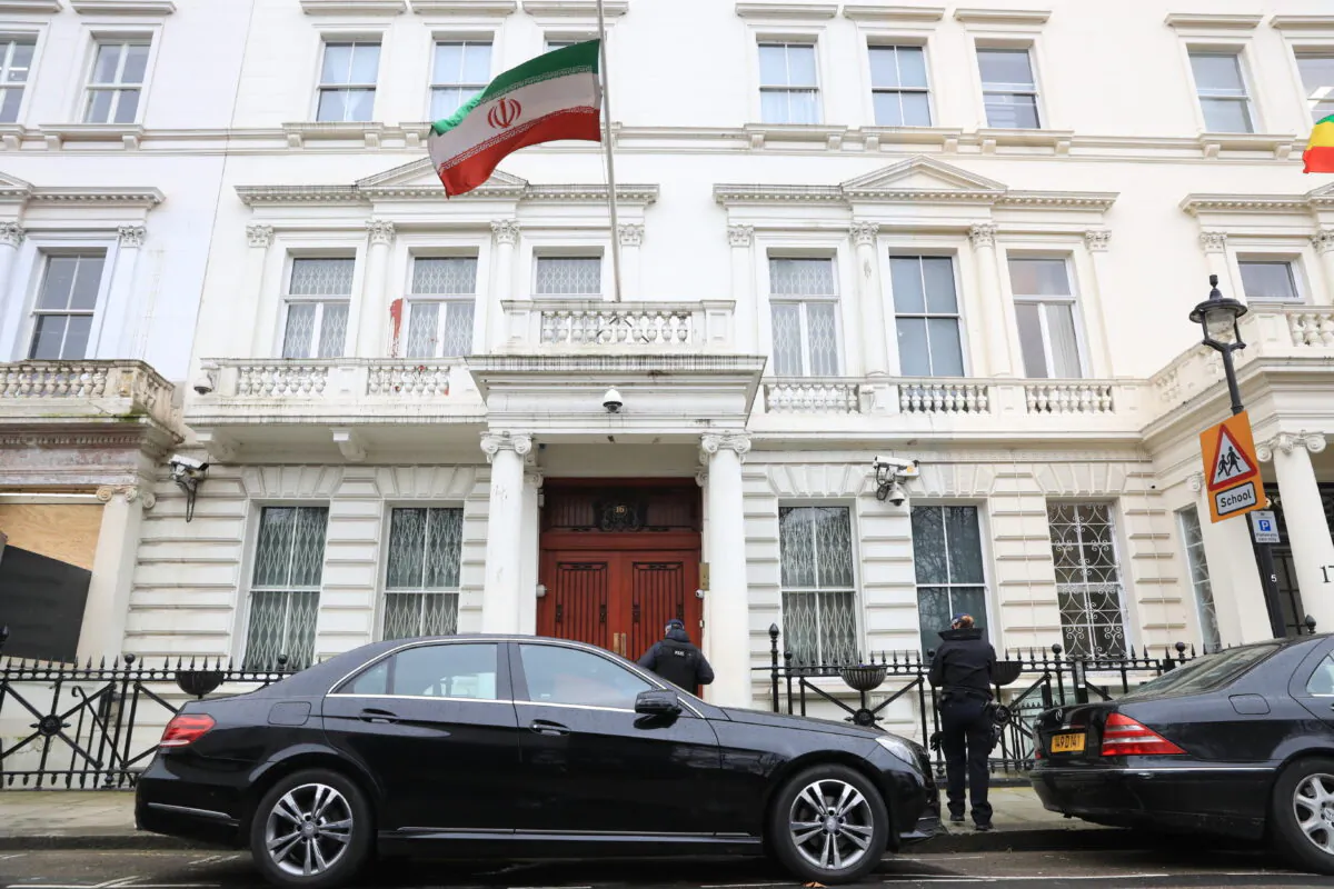 Undated photo showing police officers outside the Iranian Embassy in Knightsbridge, London. (PA Media)