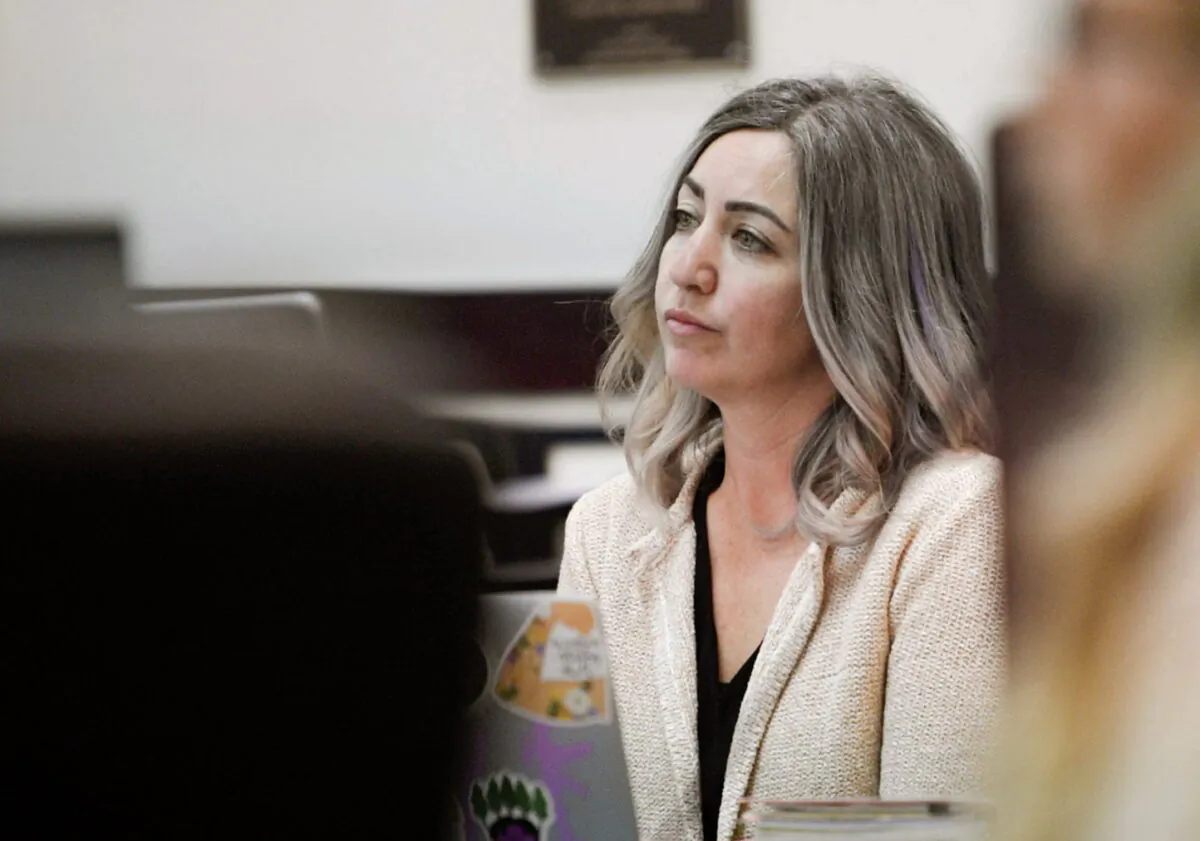 RaDonda Vaught, a former Vanderbilt University Medical Center nurse charged with in the death of a patient, listens to the opening statements during her trial at Justice A.A. Birch Building in Nashville, Tenn., on March 22, 2022. (Stephanie Amador/The Tennessean via AP, Pool)