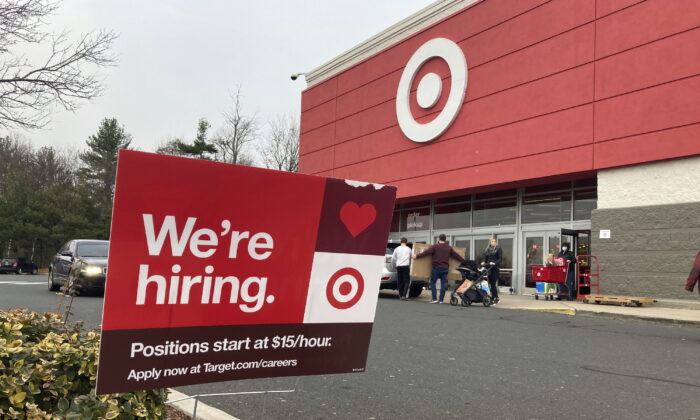 A hiring sign is in front of a Target store in Manchester, Conn. on Nov. 39, 2021. (Ted Shaffrey/AP Photo)