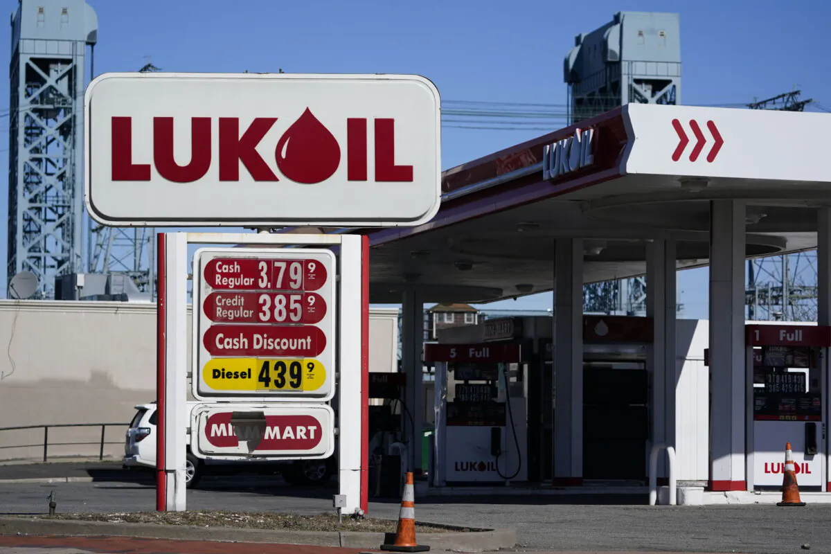 A Lukoil gas station sits in Newark, N.J., Thursday, March 3, 2022. (AP Photo/Seth Wenig)
