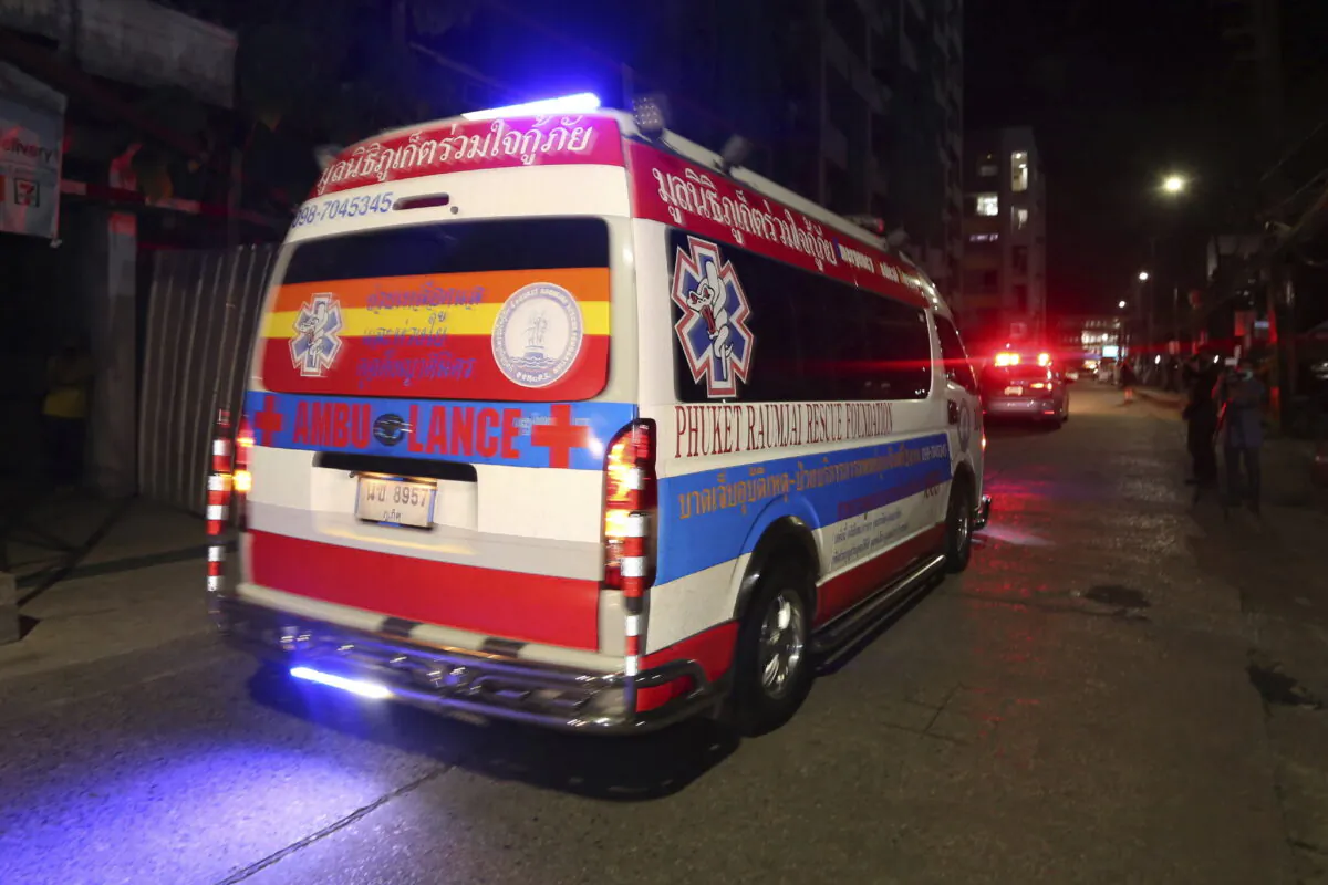 An ambulance carrying the body of Shane Warne moves from Surat Thani Hospital in the southern of Thailand to Suvarnabhumi International Airport before sending him back to Australia, on March 7, 2022. (Thanapat Cherajin/AP Photo)