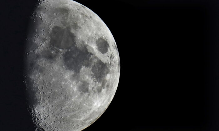 Impact craters cover the surface of the moon, seen from Berlin, on Jan. 11, 2022. (Michael Sohn/AP Photo)