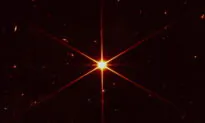Space Telescope’s Image of Star Gets Photobombed by Galaxies
