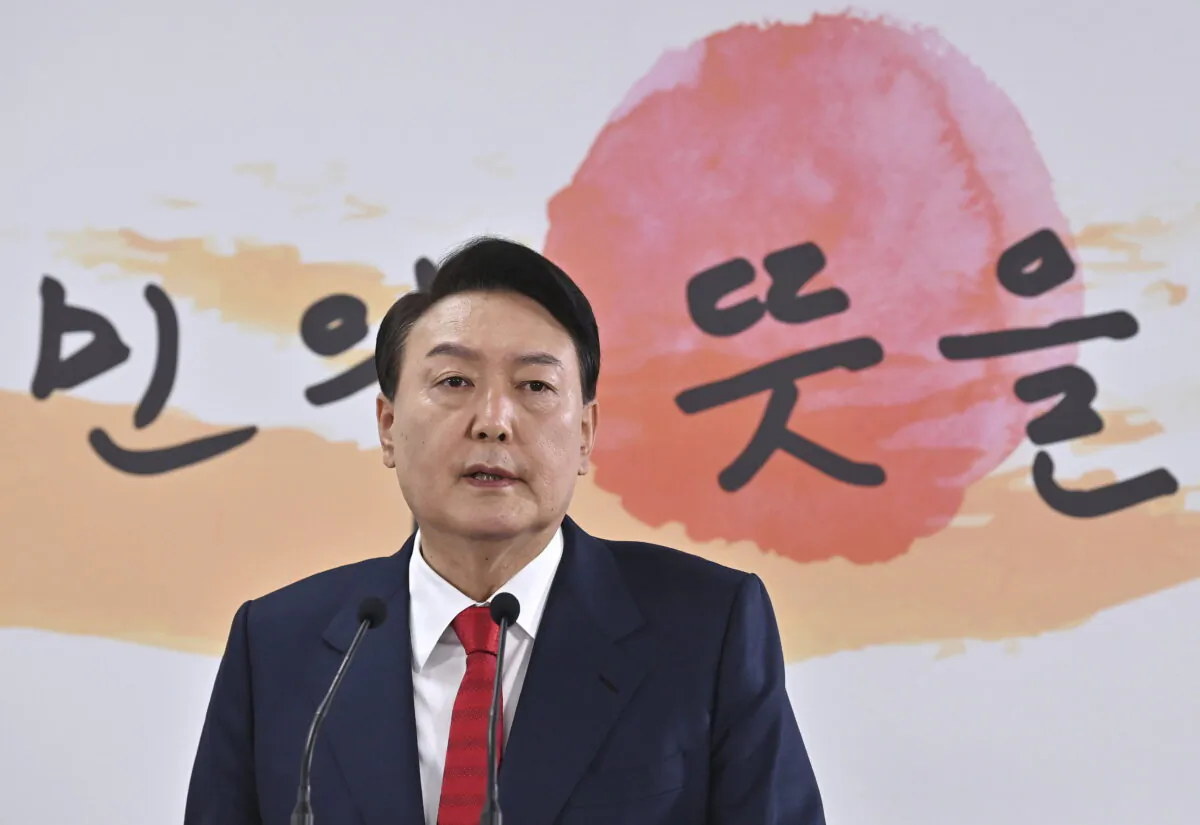 South Korea's president-elect Yoon Suk Yeol speaks during a news conference to address his relocation plans of the presidential office, in Seoul, South Korea, on March 20, 2022. (Jung Yeon-je/Pool via AP)