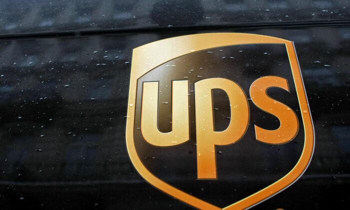 On January 16, 2013, cars in central Warsaw will display the United Parcel Service (UPS) logo.  (KacperPempel / Reuters)
