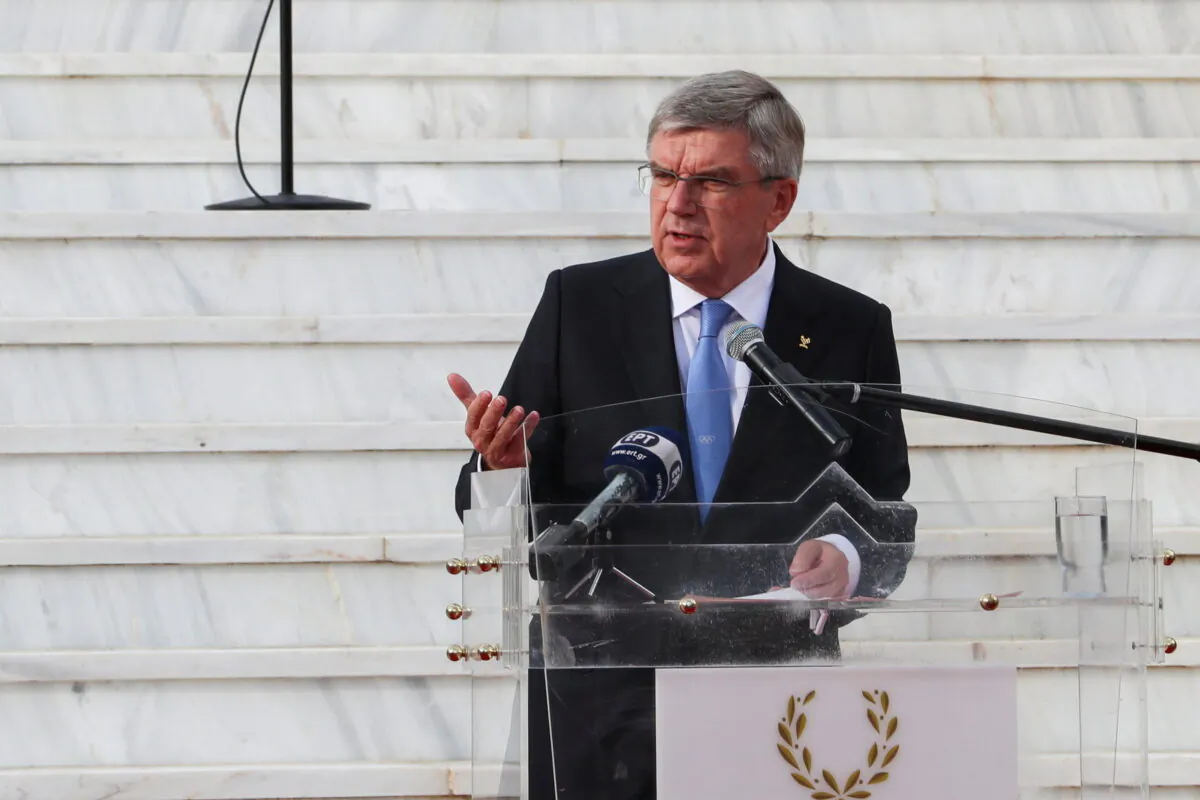 President of the International Olympic Committee (IOC) Thomas Bach delivers a speech during the official reopening of the International Olympic Academy, in Ancient Olympia, Greece, on Oct. 17, 2021. (Costas Baltas/Reuters)