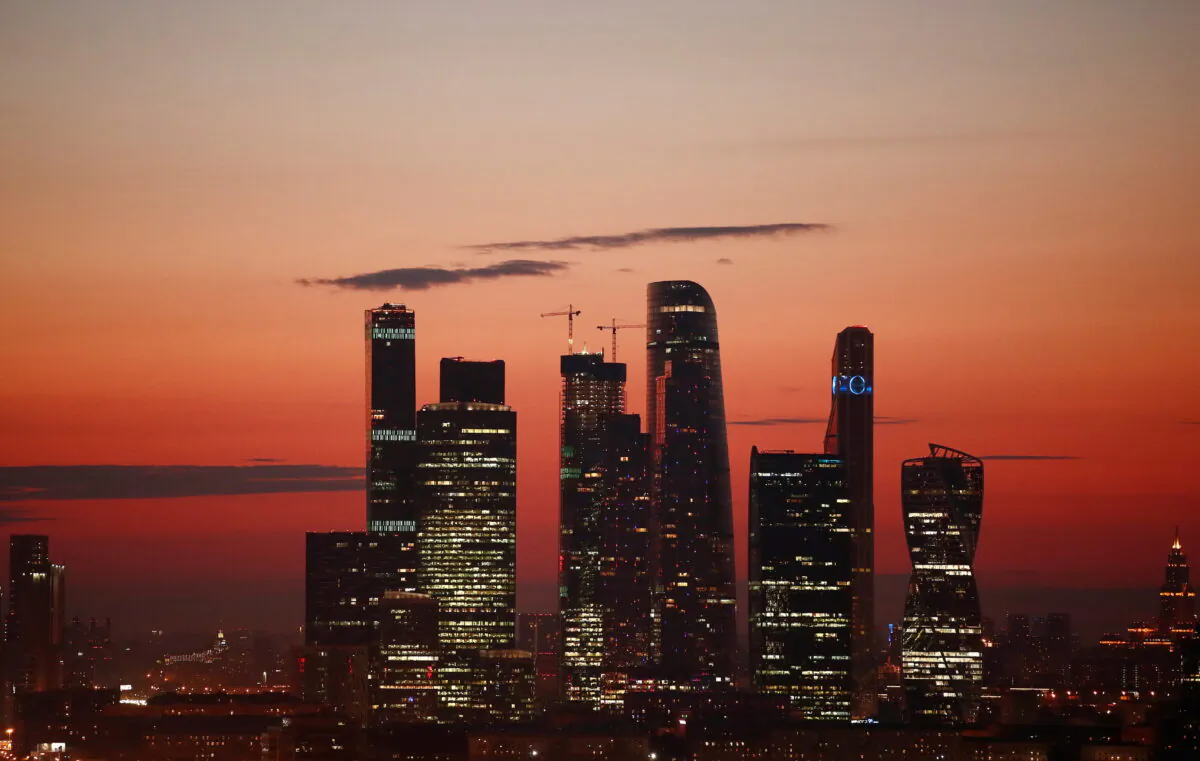 The skyscrapers of the Moscow International Business Centre, also known as "Moskva-City," are seen just after sunset in Moscow, Russia, July 12, 2018. (Christian Hartmann/Files)