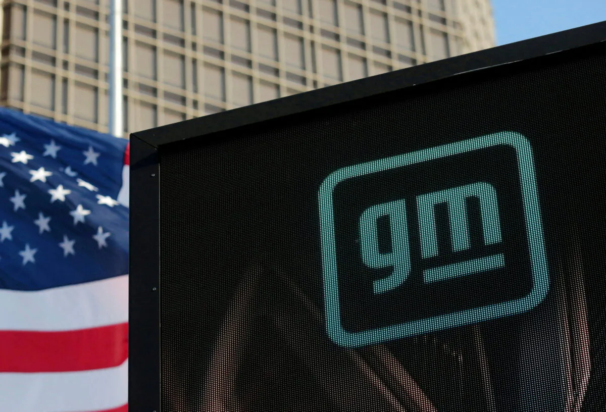 The GM logo is seen on the facade of the General Motors headquarters in Detroit, on March 16, 2021. (Rebecca Cook/Reuters)