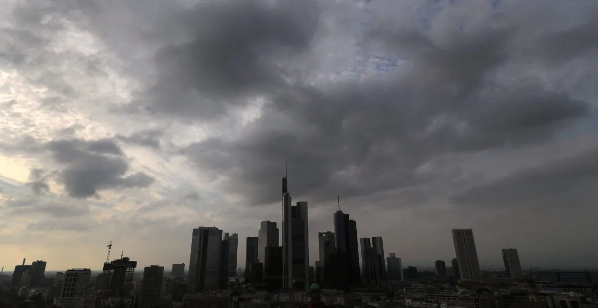 Dark clouds are seen over the skyline with its bank towers in Frankfurt, Germany, on Oct. 23, 2016. (Kai Pfaffenbach/Reuters)