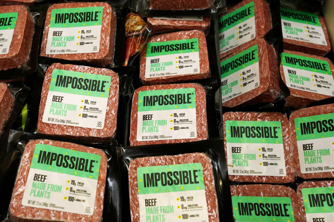 Impossible Foods plant-based beef products are seen inside a refrigerator at the meat section of a chain supermarket in Hong Kong, on Oct. 20, 2020. (Lam Yik/Reuters)